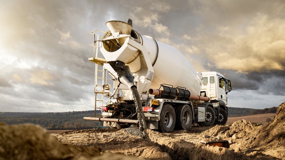 Concrete mixer with sunset background