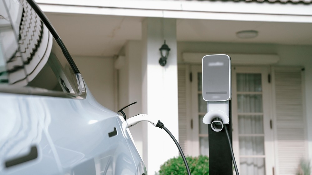 An electric charger charging a vehicle