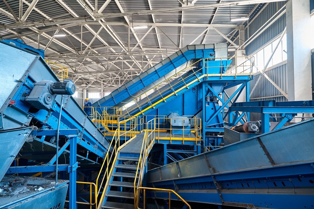 A waste and recycling baler