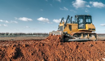 Bulldozer digging the ground 