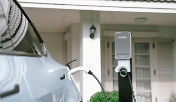 An electric charger charging a vehicle