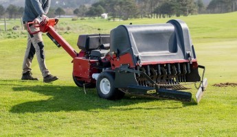 Turf aerator on a golf club