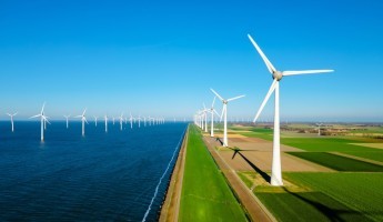 Wind turbines next to the sea