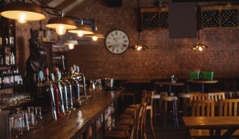 A wooden bar in a pub