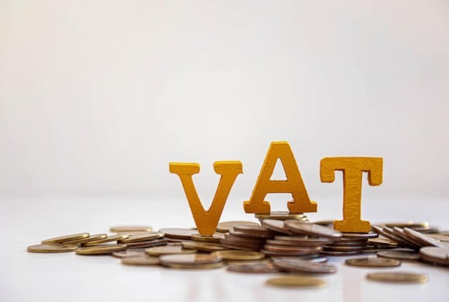 VAT word and coins