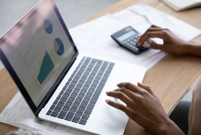 Businesswoman working on finances