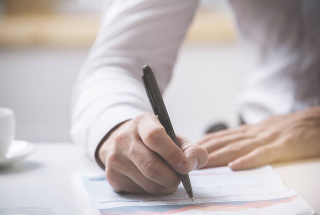 Signing a loan application