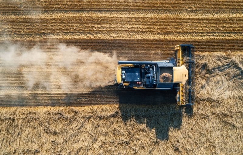 Harvester in field