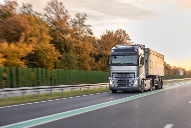 A truck driving on the road