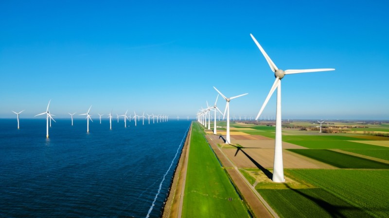 Wind turbines next to the sea